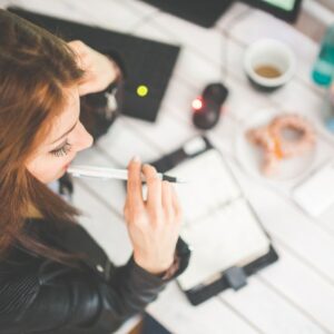 woman-hand-desk-office.jpg